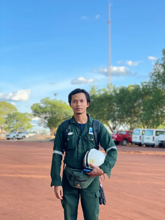 Muhammad Rafiuddin Mar Sidek in field PPE